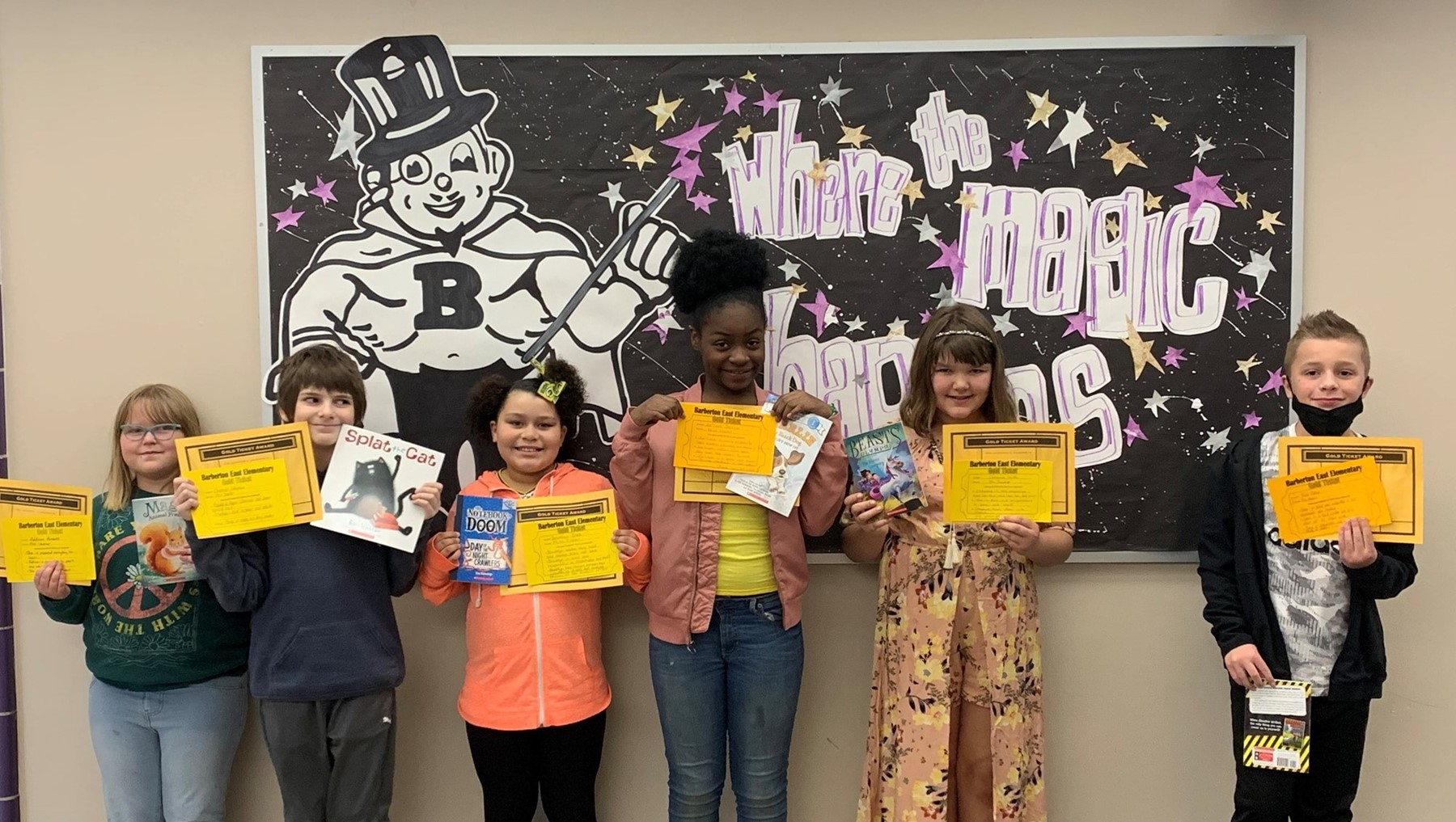 BEE Fourth Grade Golden Ticket Winners enjoying their new books from our Book Vending Machine!