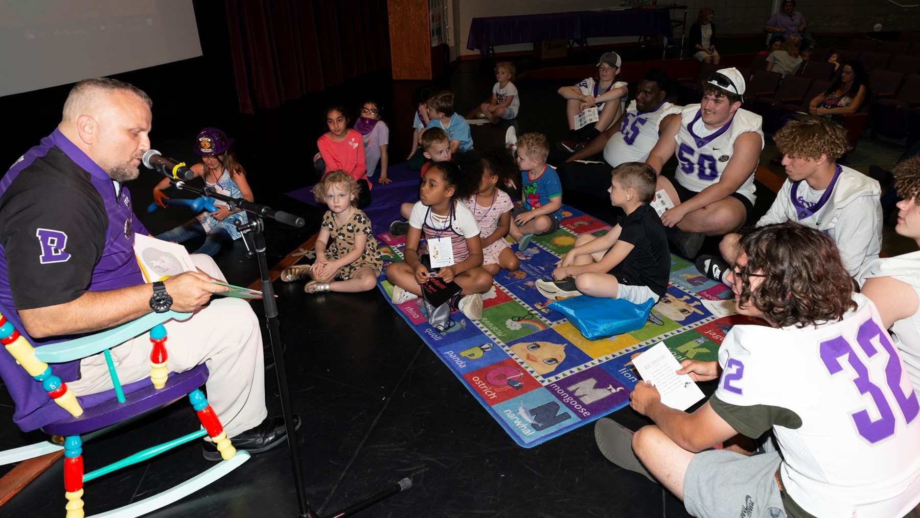 Coach Gotto and the Barberton Magics Reading to Young Magics